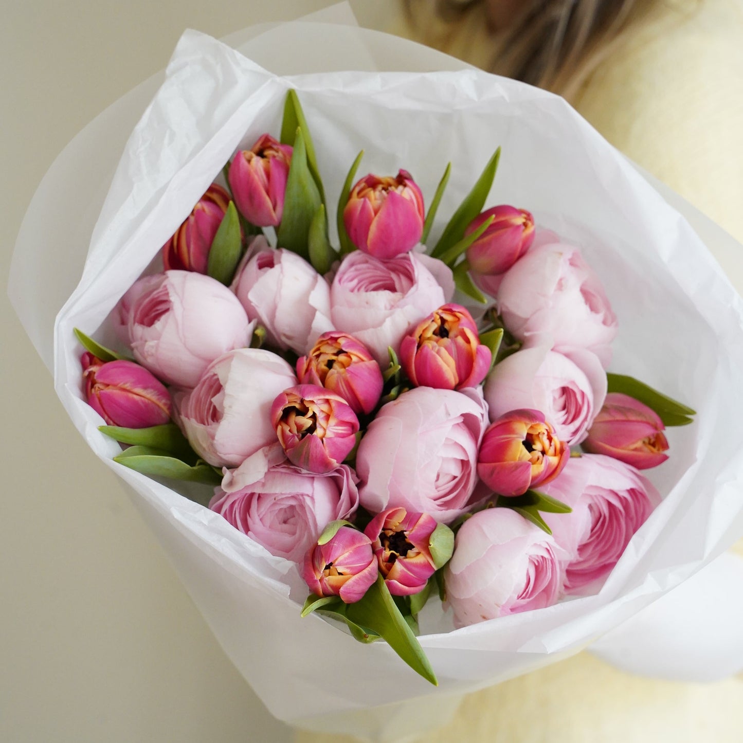 Blush ranunculus and tulips bouquet close up, elegant pastel floral arrangement Portugal