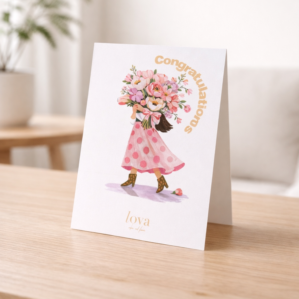 Greeting card with a illustration of a girl holding flowers on a wooden table.