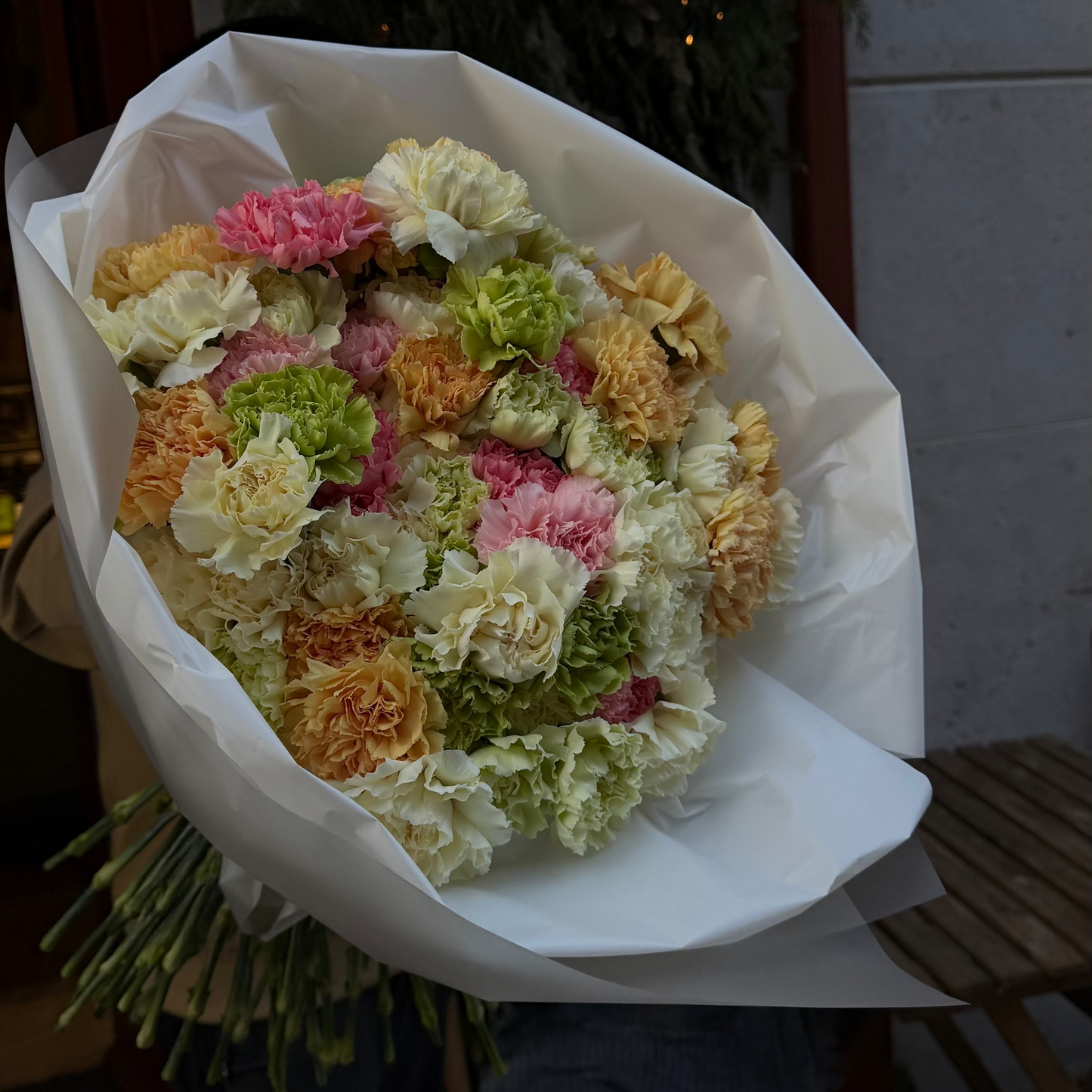 Large mixed dianthus bouquet with 50 stems, lush pastel carnations wrapped in white paper