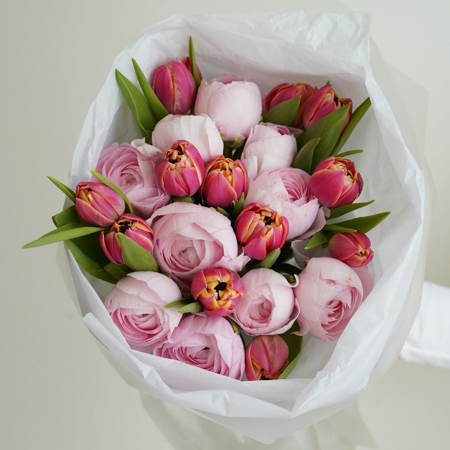 Romantic pastel bouquet with ranunculus and tulips, premium flower gift Lisbon
